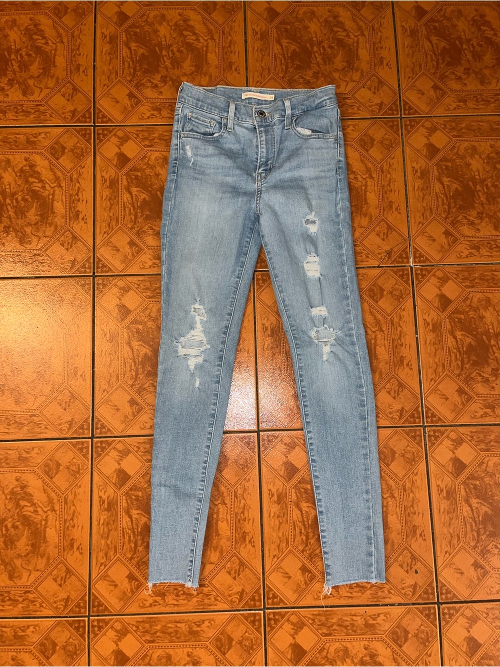 Levi's Light Blue Ripped Skinny Jeans for Women